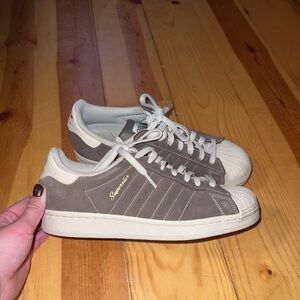 Brown adidas women’s sneakers. Lightly worn. Size 9.
